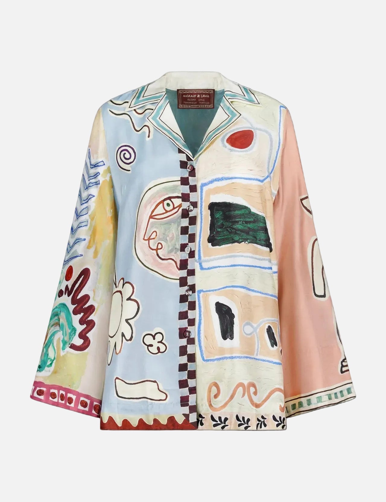 The Michelle Relaxed Silk Shirt by ALEMAIS features a colorful abstract design with blue, green, yellow, red, and beige shapes—a unique long-sleeve piece from an exclusive LRNCE artist collaboration.