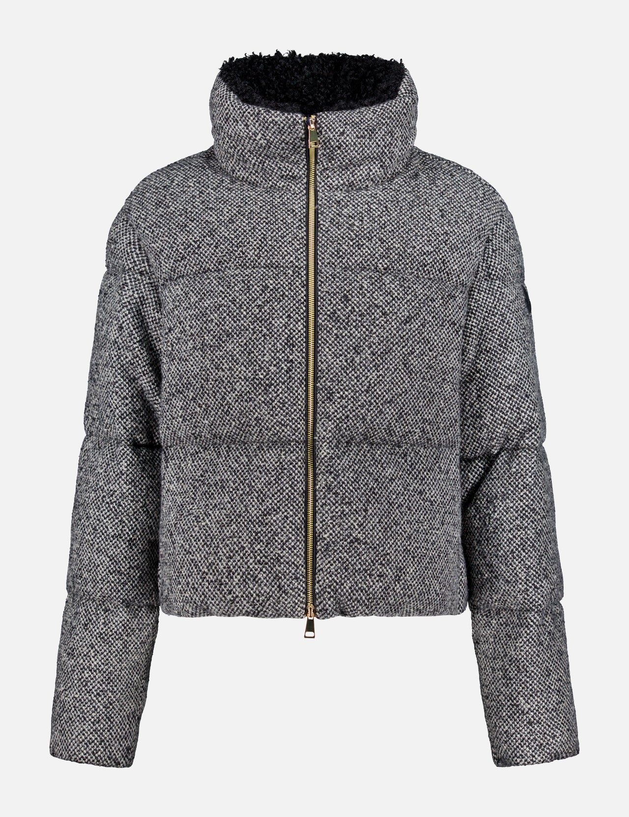 The MONCLER Brezesse Bouclé Jacket is a gray textured puffer with a high collar, teddy lining, long sleeves, and front gold zipper, shown on a plain white background.