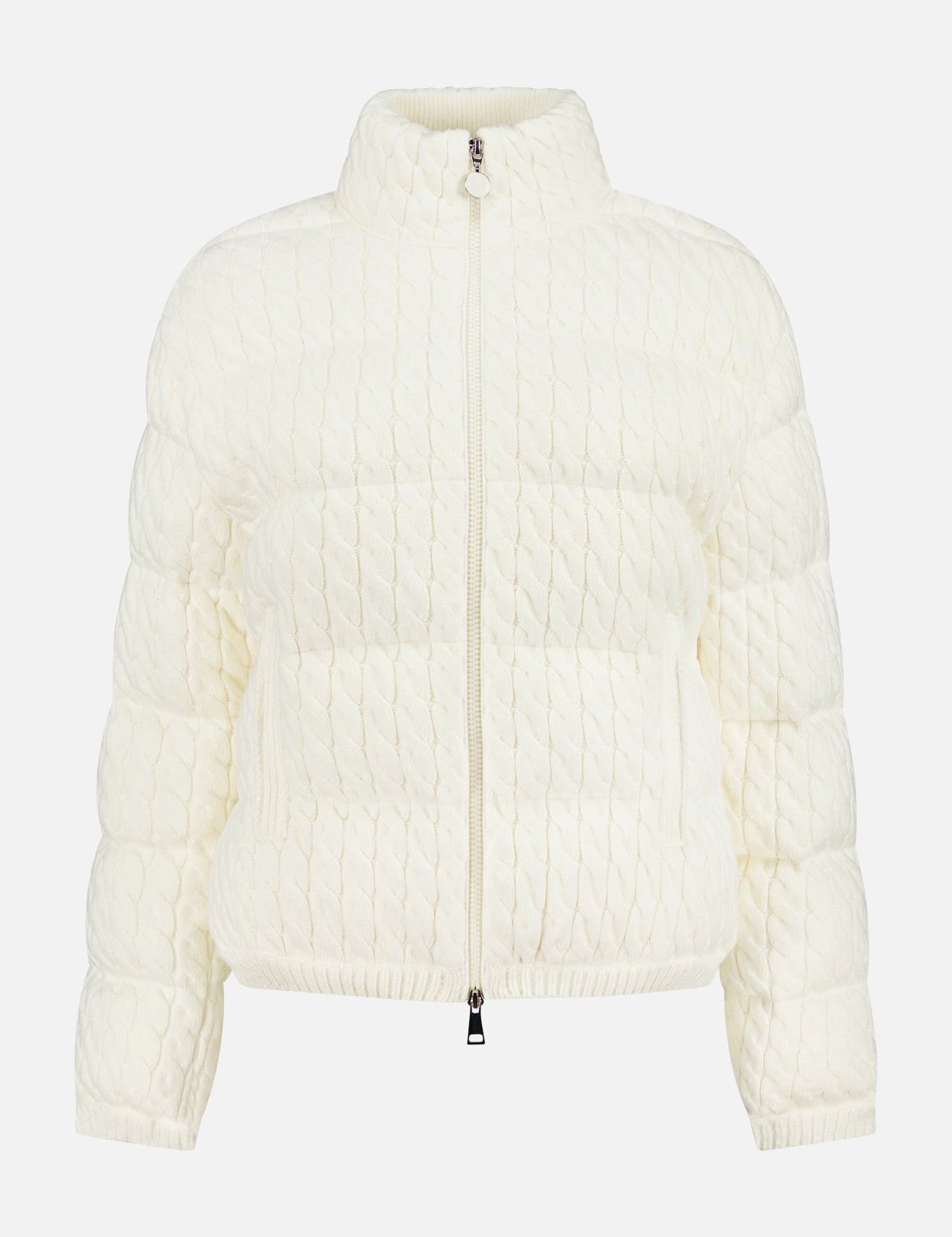 A front view of the MONCLER Cable Knit Cardigan in white, featuring a high collar, full-length zipper, and elastic cuffs, displayed on a plain white background.