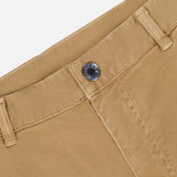 Close-up of MONCLER Stretch Cotton Cargo Trouser Pants in tan, featuring a metal button, belt loop, and visible pocket stitching against a white background.