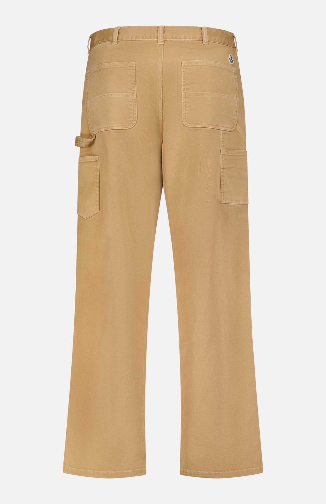 Back view of MONCLER Stretch Cotton Cargo Trouser Pants in tan, featuring multiple patch pockets, belt loops, and a side utility loop detail, shown against a plain white background.