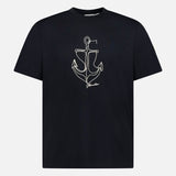 The MONCLER Anchor Graphic Short Sleeve T-shirt features a black design with a minimalist white anchor graphic and "freedom" text on the front.