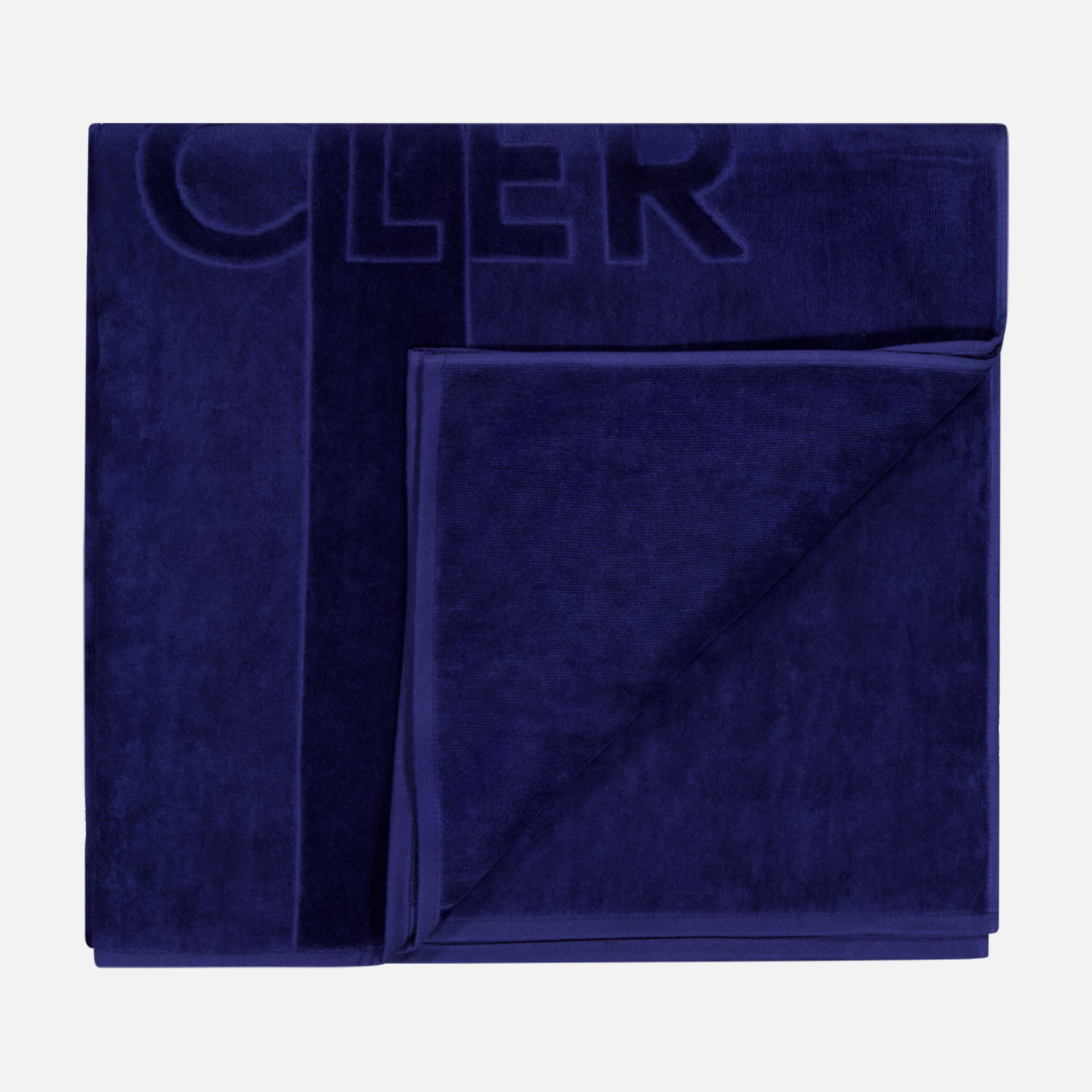 The MONCLER Logo Beach Towel, featuring a subtle embossed design and border in dark blue, is neatly folded and displayed on a light gray background.