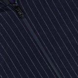 Close-up of the MONCLER Ceze Striped Reversible Jacket in navy, featuring thin white vertical pinstripes and a black center zipper.