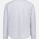 A back view of the MONCLER Reversible Crescent Shirt Jacket featuring long sleeves, button cuffs, and thin vertical blue and white stripes, shown against a plain white background.