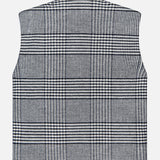 The MONCLER Gienah Houndstooth Reversible Vest is a sleeveless wool-blend piece with a high collar, featuring black, white, and blue plaid details. Shown laid flat with the back facing up.