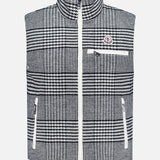 The MONCLER Gienah Houndstooth Reversible Vest features a black and white houndstooth pattern, high collar, front zipper, three white zippered pockets, chest logo patch, and offers stylish warmth.