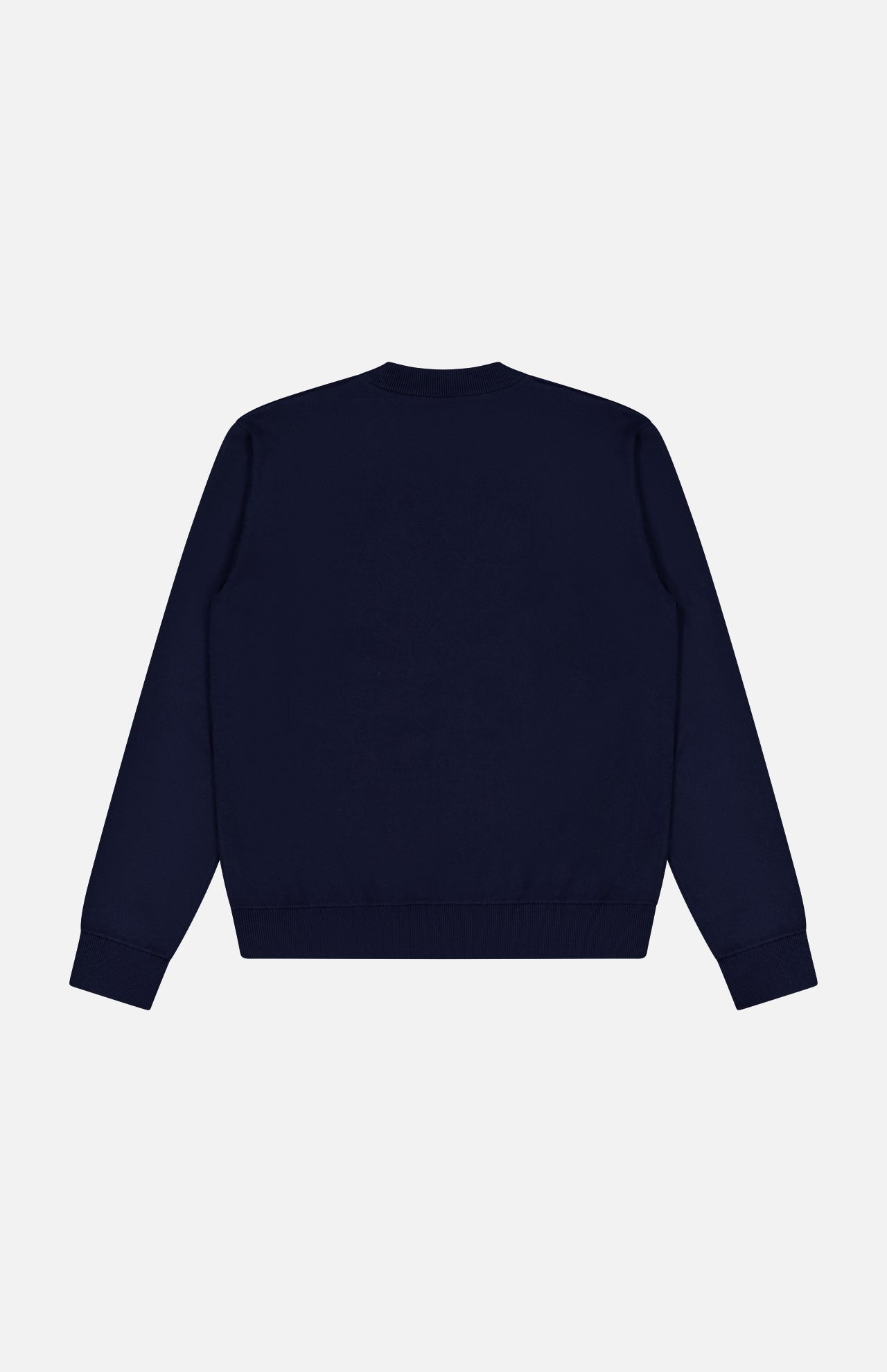 The MONCLER Long Sleeve Crewneck T-Shirt is shown from the back in plain navy, featuring ribbed cuffs and hem, set against a white background.