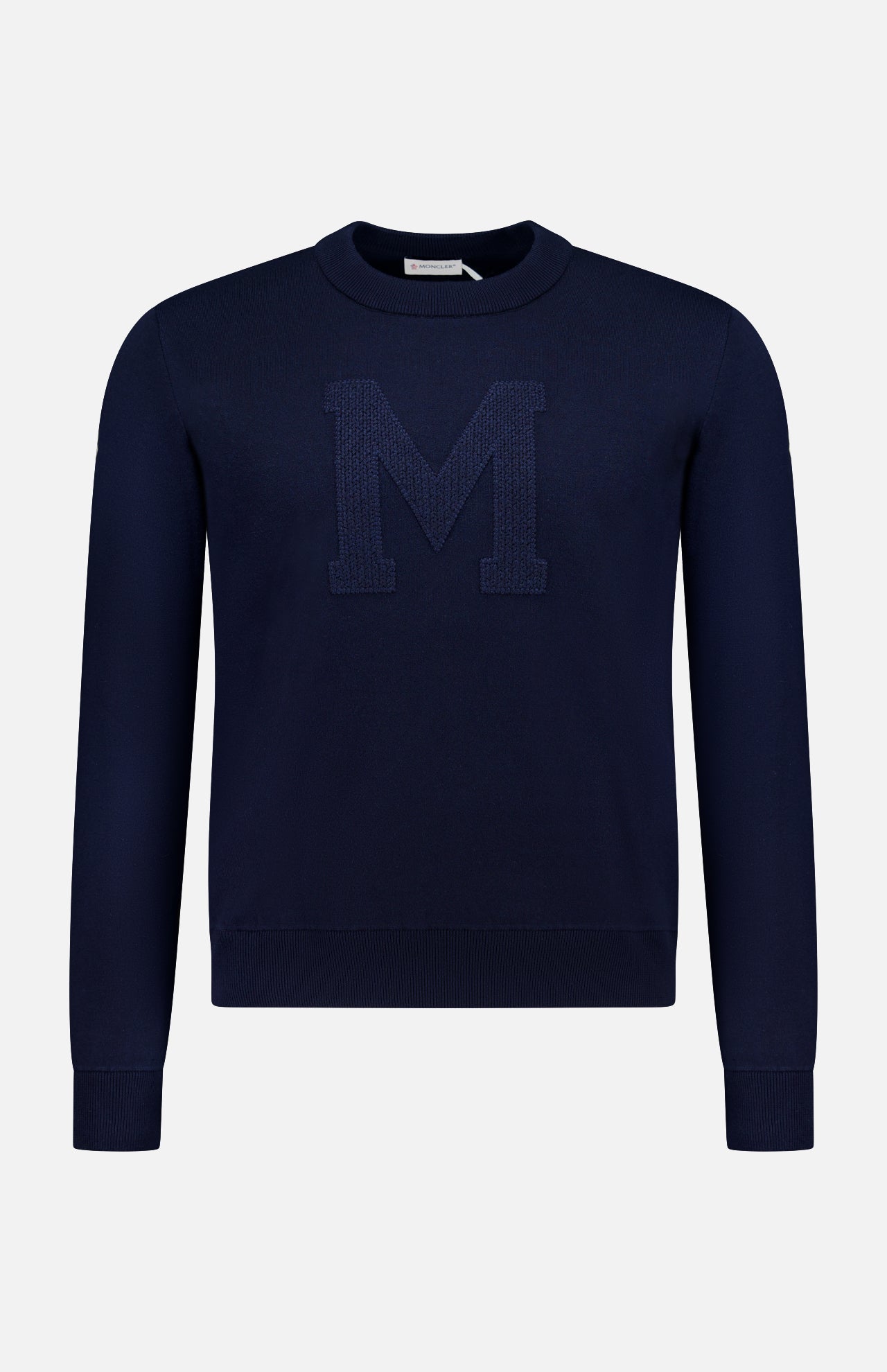 This MONCLER Long Sleeve Crewneck T-Shirt for men is navy with a large textured "M" on the front, shown against a plain white background.