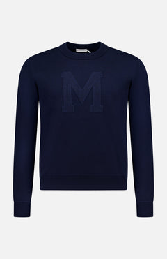 This MONCLER Long Sleeve Crewneck T-Shirt for men is navy with a large textured "M" on the front, shown against a plain white background.