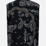 The MONCLER Reversible Paisley Fleece Vest is a black sleeveless piece with a high collar, showcasing a striking white and gold paisley bandana print across the back. Inspired by the iconic Moncler padded vest style, it offers both warmth and standout style.