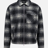 MONCLER Plaid Two-way Zip Overshirt for men, featuring a black and white plaid pattern, a collared neckline, and a single chest pocket, displayed against a plain white background.