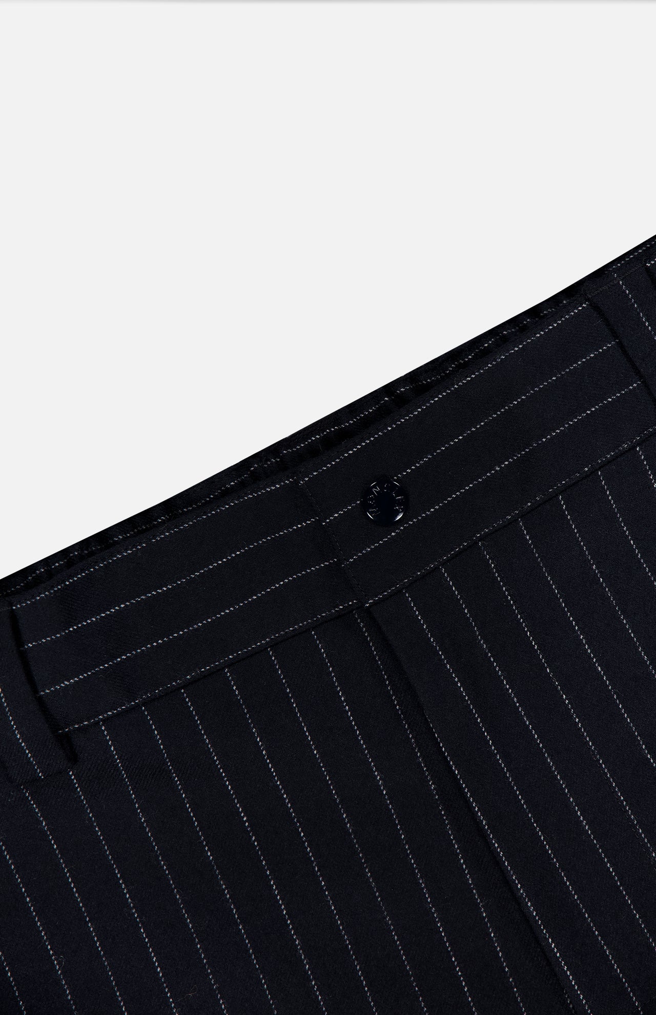 Close-up of the waistband and upper section of MONCLER Striped Drawstring Trousers against a light background, showcasing the button closure and crisp vertical stripes for a modern take on classic style.