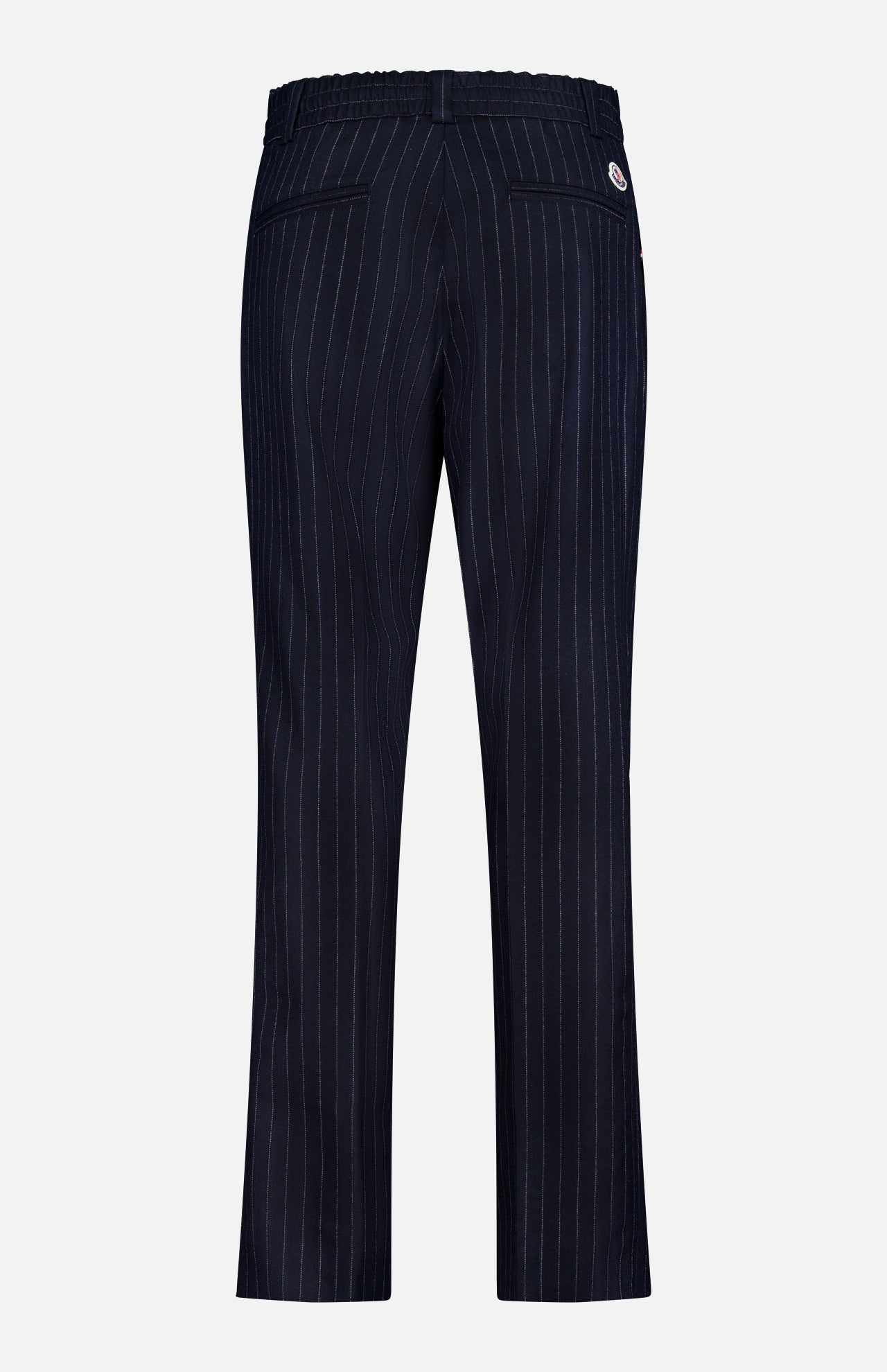 Back view of MONCLER Striped Drawstring Trousers in navy blue featuring two back welt pockets, a small circular logo patch on the waistband, and a straight-leg cut for a classic look.