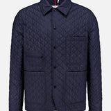 Theoline Quilted Overshirt by MONCLER features a navy quilted design with a pointed collar, button front, two chest pockets, and two hip pockets—a must-have for men’s outerwear.