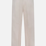Back view of MONCLER Drawstring Stretch Cotton Trousers in light beige featuring an elastic waistband with drawstring, belt loops, and two back welt pockets—one with a button closure.