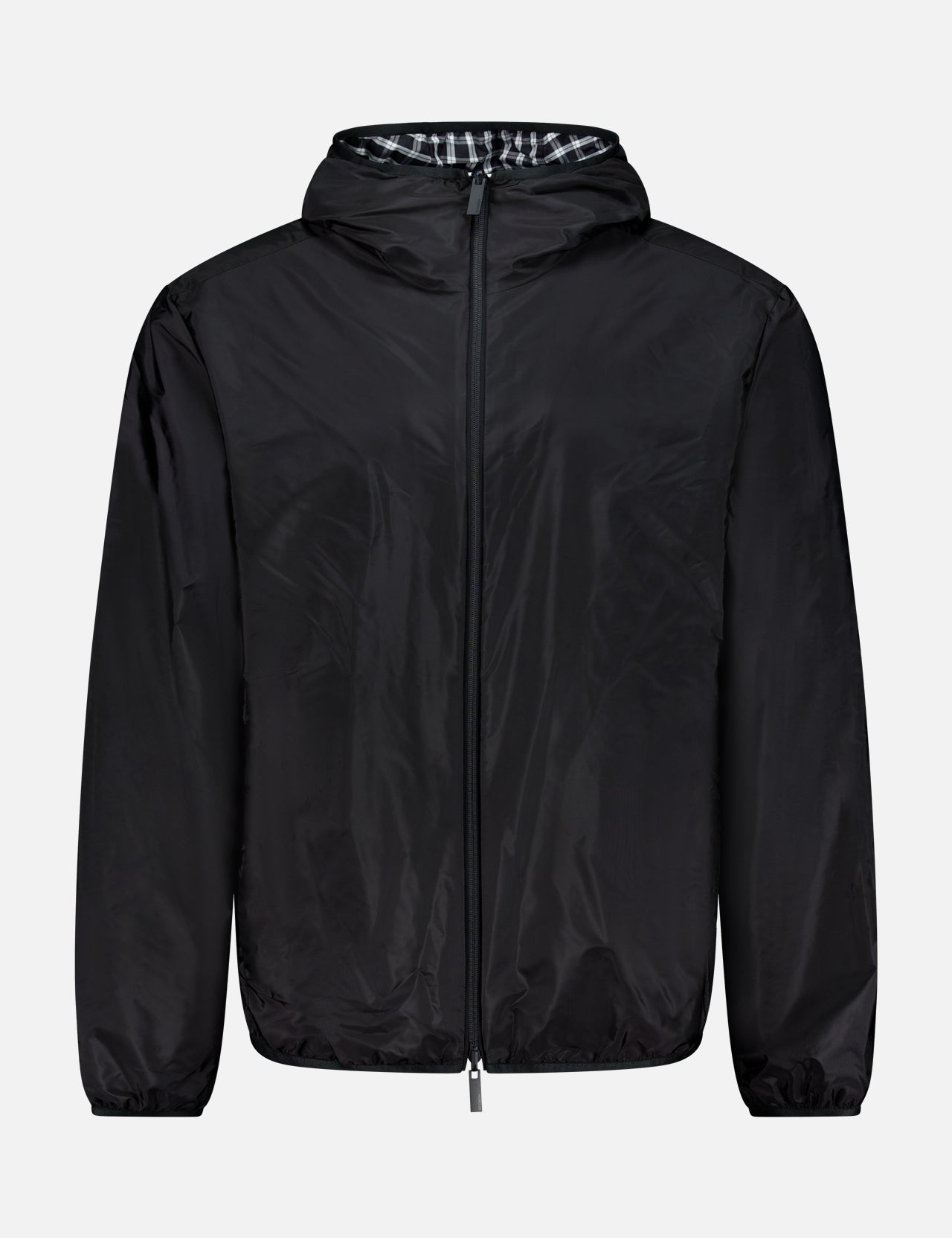 The MONCLER Vandelli Reversible Plaid Jacket is a lightweight black hooded zip-front piece featuring elastic cuffs and a subtle inner plaid lining, shown against a plain white background—making it the ideal versatile outerwear for any season.