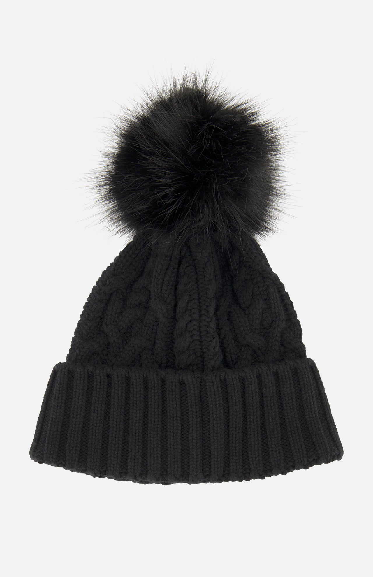 The Cableknit Pom Beanie by MONCLER is a black knit beanie featuring a large, fluffy faux fur pom-pom on top and a wide, ribbed fold-over brim, exuding the cozy style characteristic of classic Moncler beanies. Shown here against a plain white background.