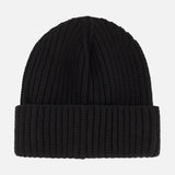 A black MONCLER Tonal Logo Beanie, crafted from luxurious virgin wool and cashmere with a ribbed texture and folded cuff, is displayed on a plain white background.