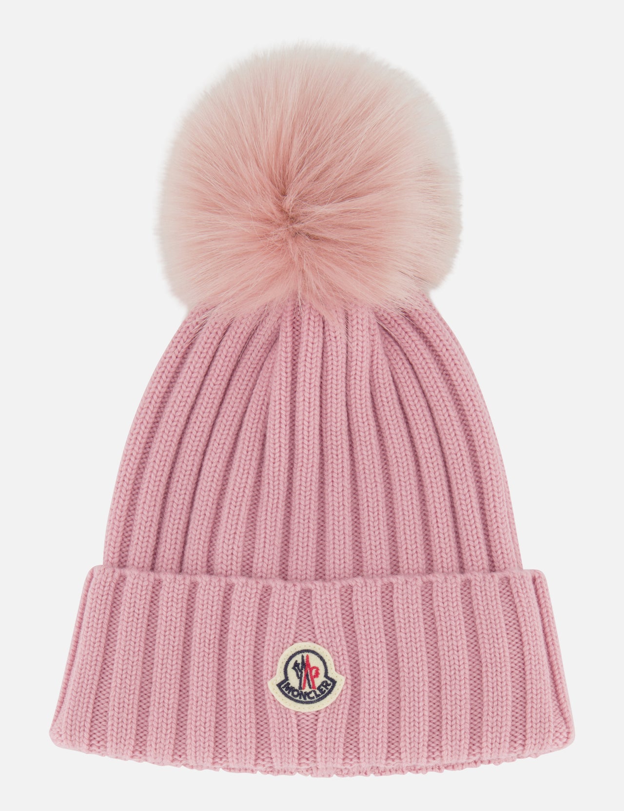Introducing the MONCLER Ribbed Pom Beanie—crafted in pink ribbed knit with a large, fluffy faux fur pom pom on top and a folded brim accented by a small embroidered logo patch at the front.