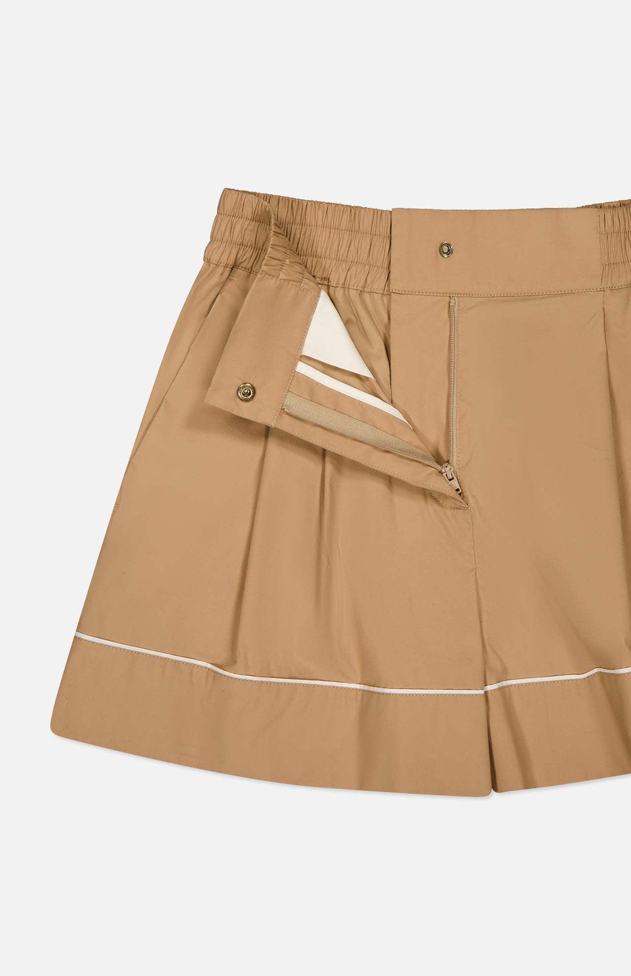 The Brushed Techno Cotton Shorts by MONCLER feature a beige pleated design with a side zipper, snap button closure, white lining and pocket. Inspired by tailored shorts, they offer an elastic waistband and white trim near the hem.