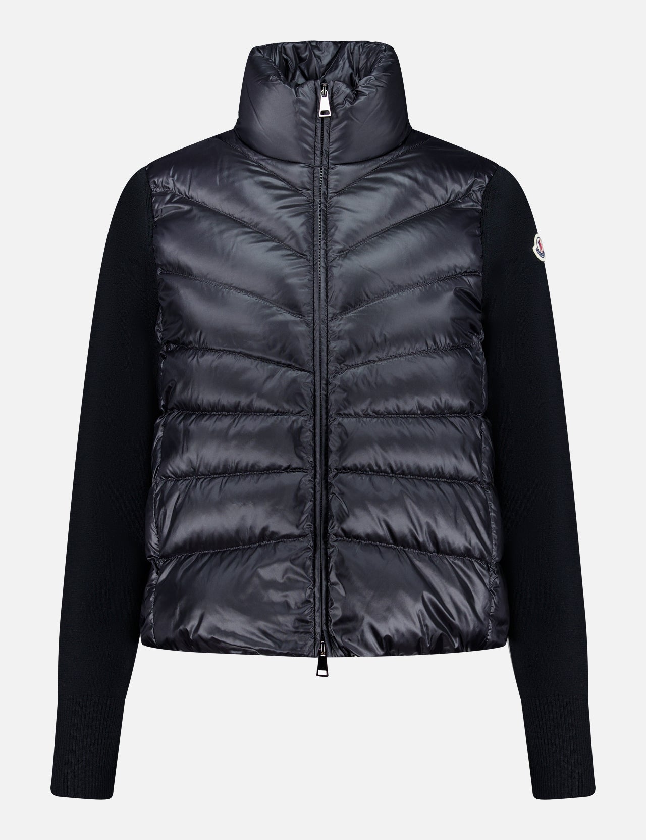 Crafted by MONCLER, the Extrafine Wool Cardigan features a high collar and full front zipper, with quilted panels on the front and back and solid black sleeves. This padded black cardigan blends exceptional warmth with contemporary style.