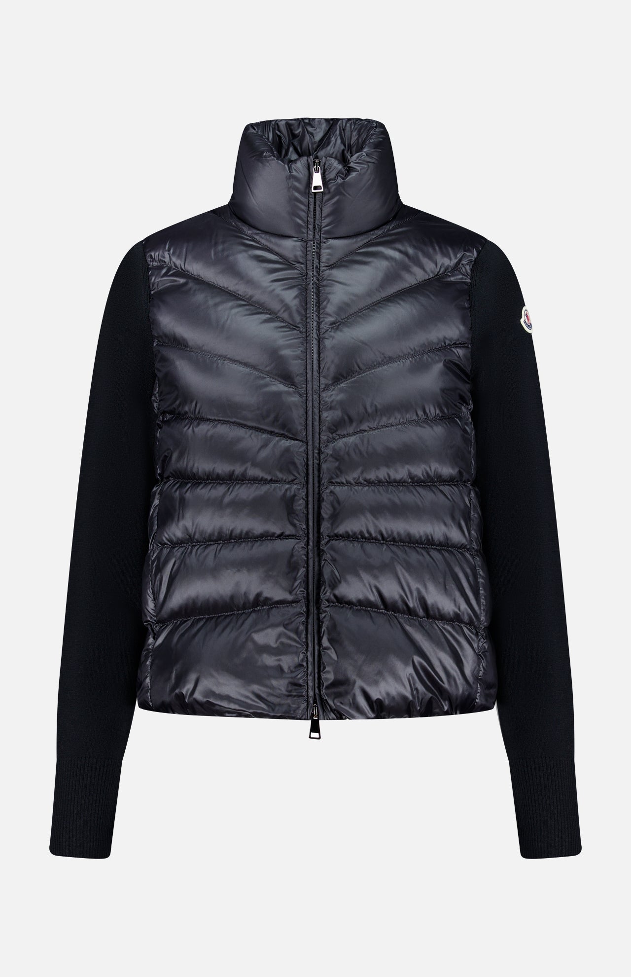 Crafted by MONCLER, the Extrafine Wool Cardigan features a high collar and full front zipper, with quilted panels on the front and back and solid black sleeves. This padded black cardigan blends exceptional warmth with contemporary style.