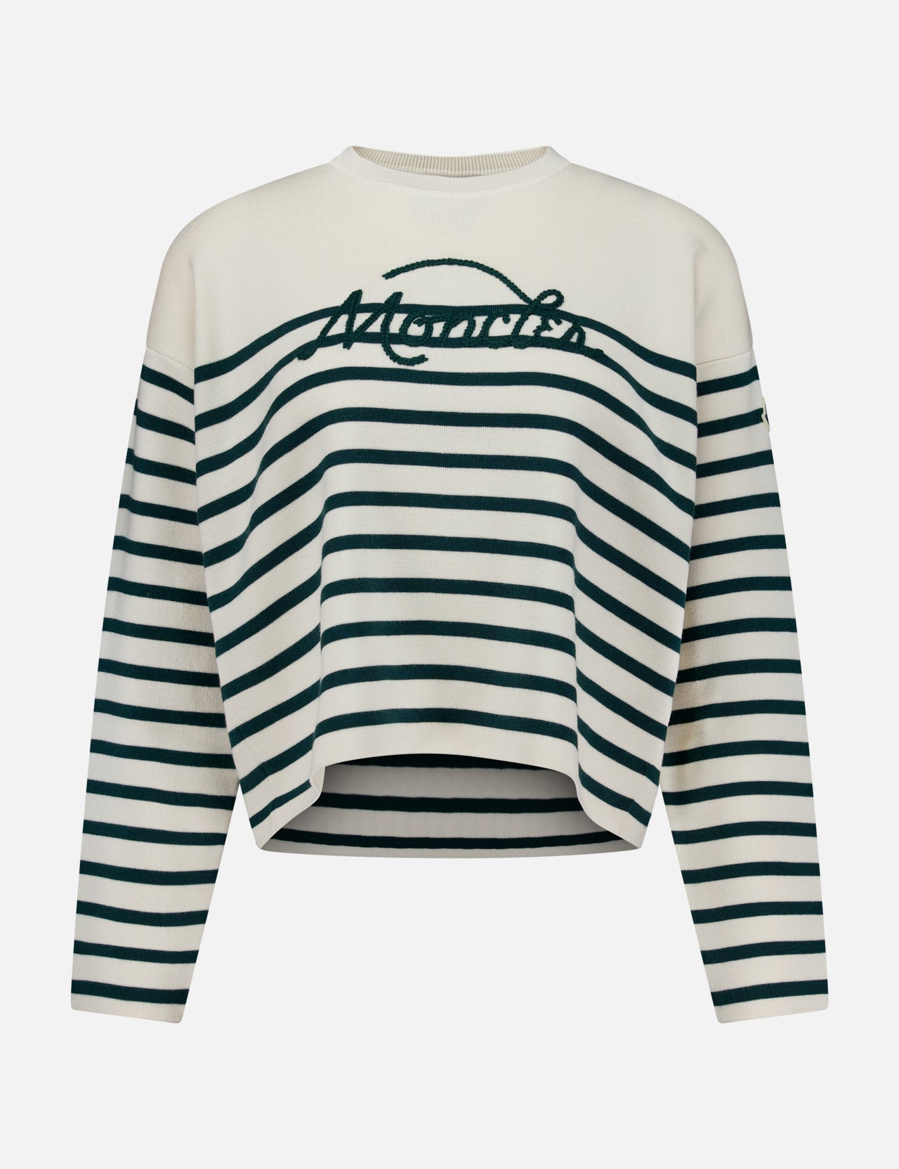 Introducing the Extrafine Wool Crewneck Sweater from MONCLER: a cream-colored, long-sleeve sweater adorned with dark green nautical stripes and ‘Merci’ elegantly scripted in cursive across the chest. Crafted from extra-fine wool, this sweater offers a slightly cropped, loose fit for effortless style and comfort.