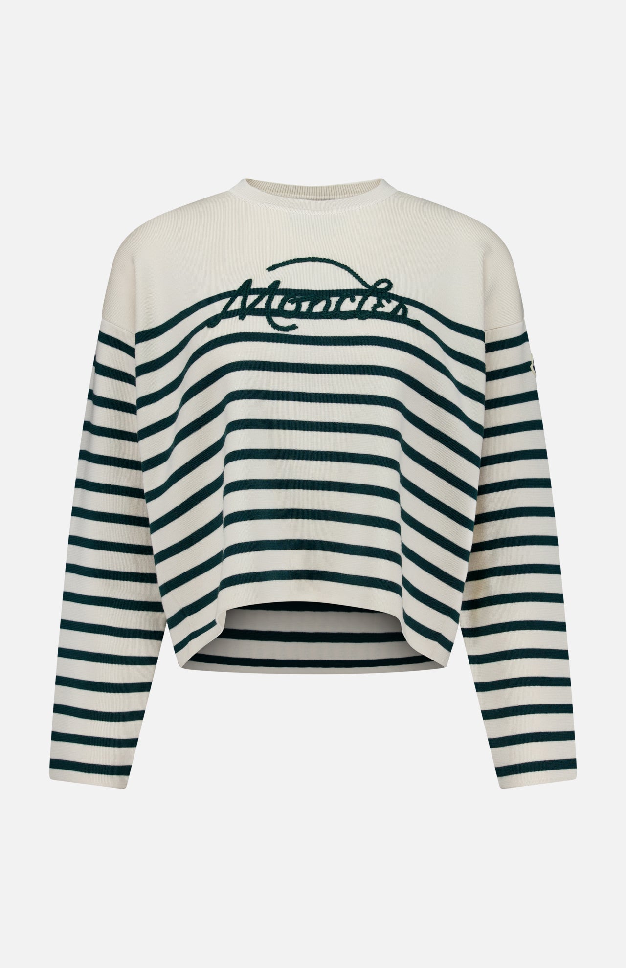 Introducing the Extrafine Wool Crewneck Sweater from MONCLER: a cream-colored, long-sleeve sweater adorned with dark green nautical stripes and ‘Merci’ elegantly scripted in cursive across the chest. Crafted from extra-fine wool, this sweater offers a slightly cropped, loose fit for effortless style and comfort.