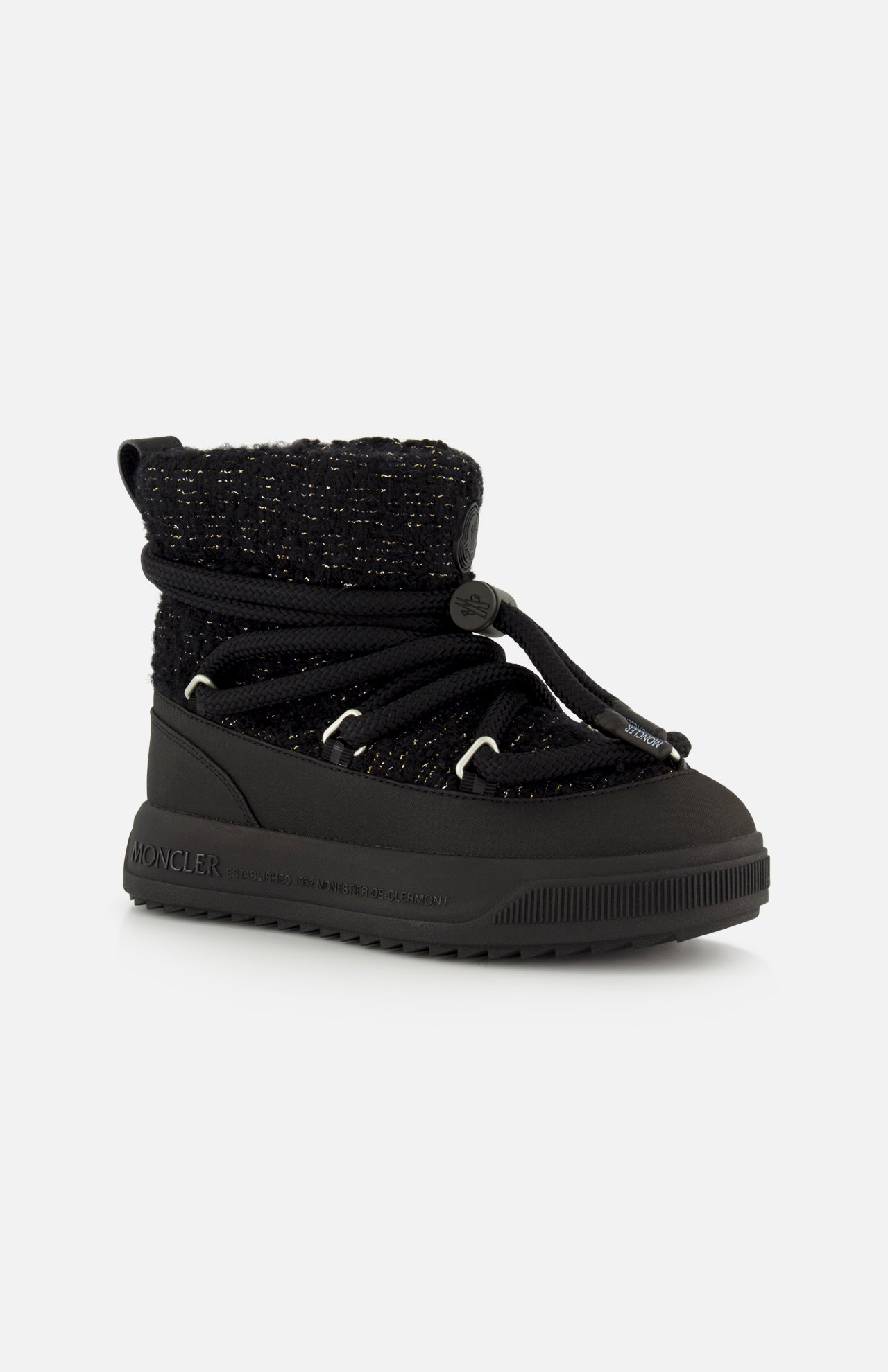 Black mid-calf Moncler Altive Mid Snow Boots featuring a textured fabric upper, thick rope laces, and a chunky Vibram MEGAGRIP rubber sole.