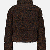 The MONCLER Trascendance Tweed Jacket is a brown and black textured, long-sleeve teddy jacket featuring a high collar and showcased against a plain white background. Channeling the timeless style of classic tweed, this cozy piece boasts a soft feel with a boxy, cropped fit—making it an elevated addition to any women’s outerwear collection.