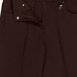 A close-up of MONCLER Straight Leg Trouser Pants in brown wool gabardine, featuring a partially open zipper and button fly, with gold accents and front pockets.
