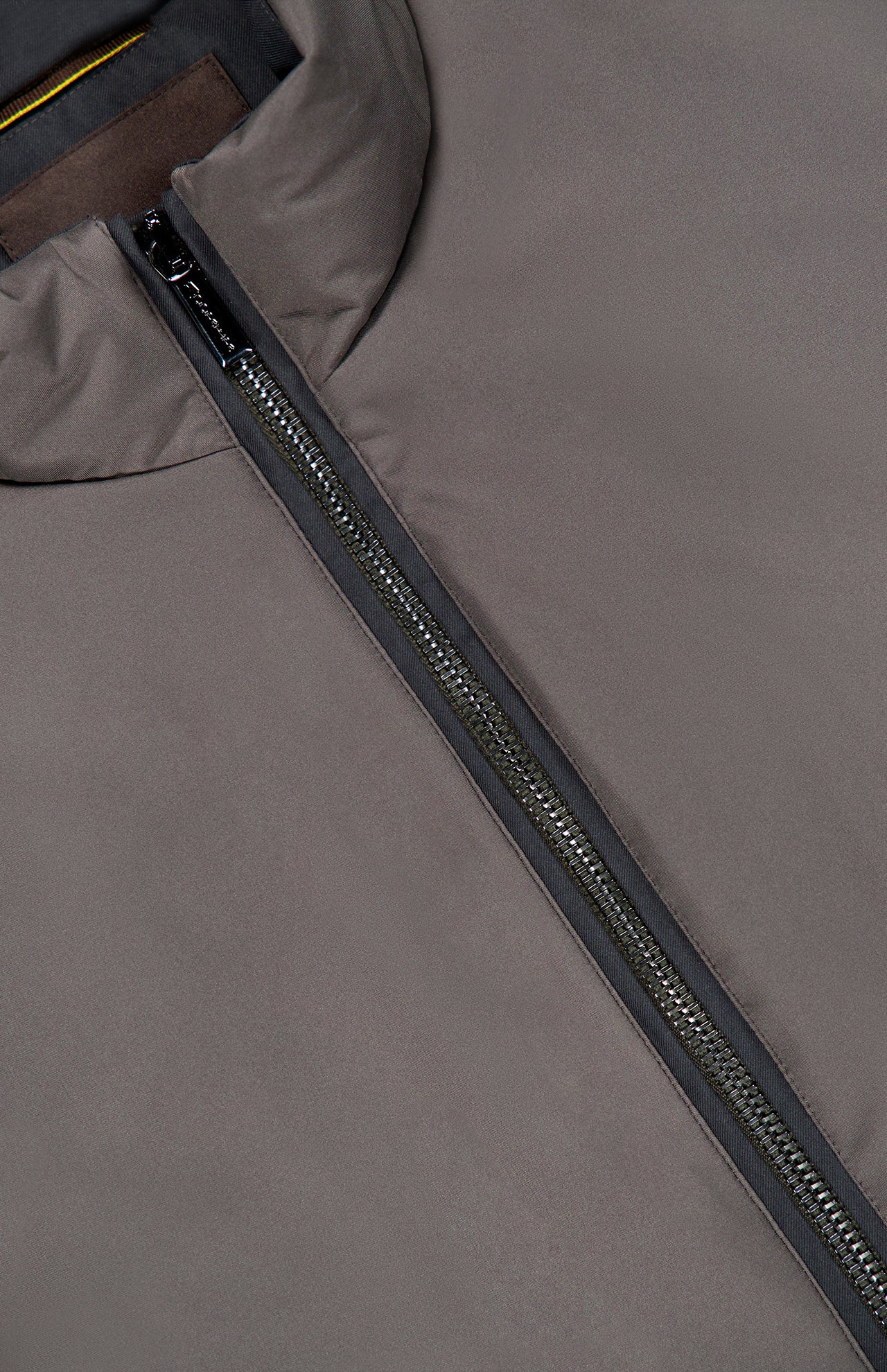 Close-up of a grey down-filled MooRER USA Traylor Vest featuring a central dark zipper and a dark brown inner collar lining.