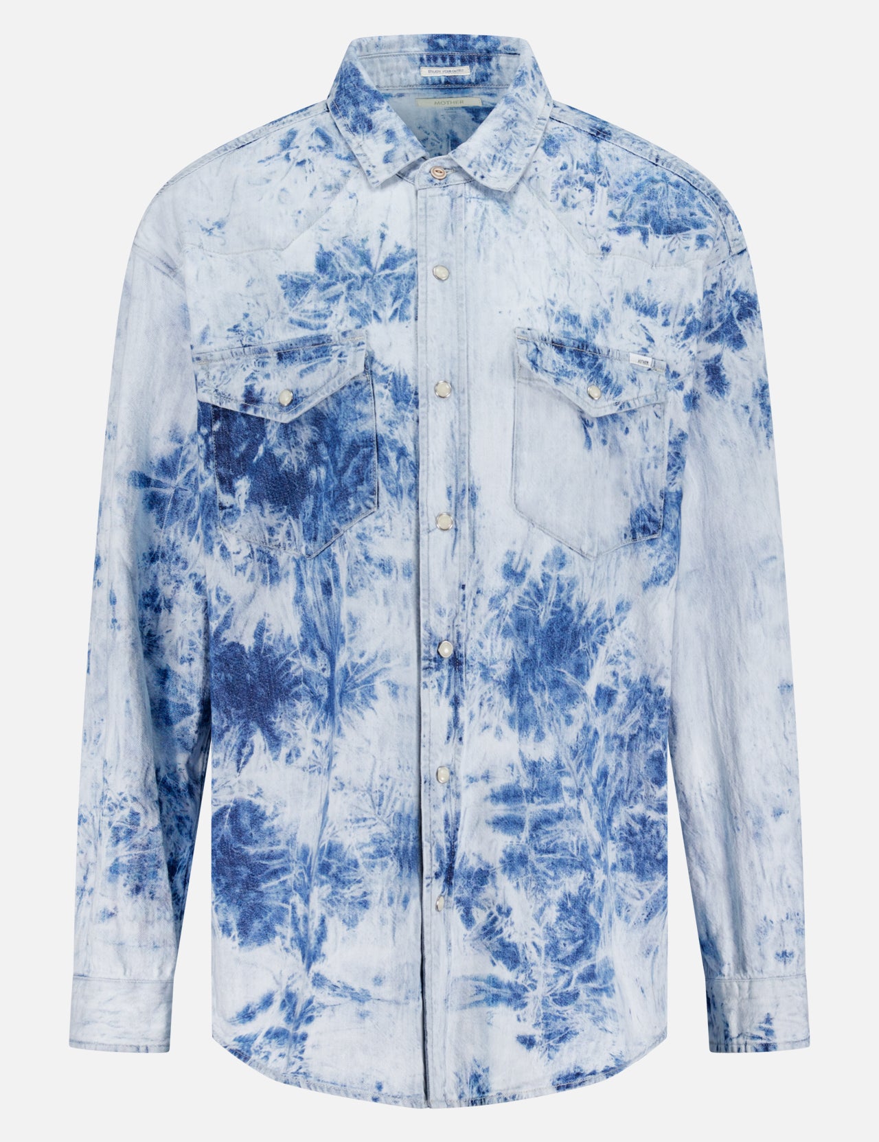 The Exes And Ohs Overshirt by MOTHER is a Western-inspired, long-sleeve button-up with two chest pockets and a light blue and white tie-dye floral print on crisp white.