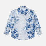 The Exes And Ohs Overshirt by MOTHER features a blue and white tie-dye design, classic collar, and buttoned cuffs. This long-sleeved, oversized shirt is shown from the back for a modern, relaxed vibe.