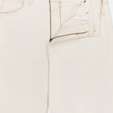 The Scooter Skimp Flare Leg Pant by MOTHER is a pair of off-white, high-rise jeans shown with the waistband unbuttoned and zipper partially open, revealing the inside pocket and fly area.