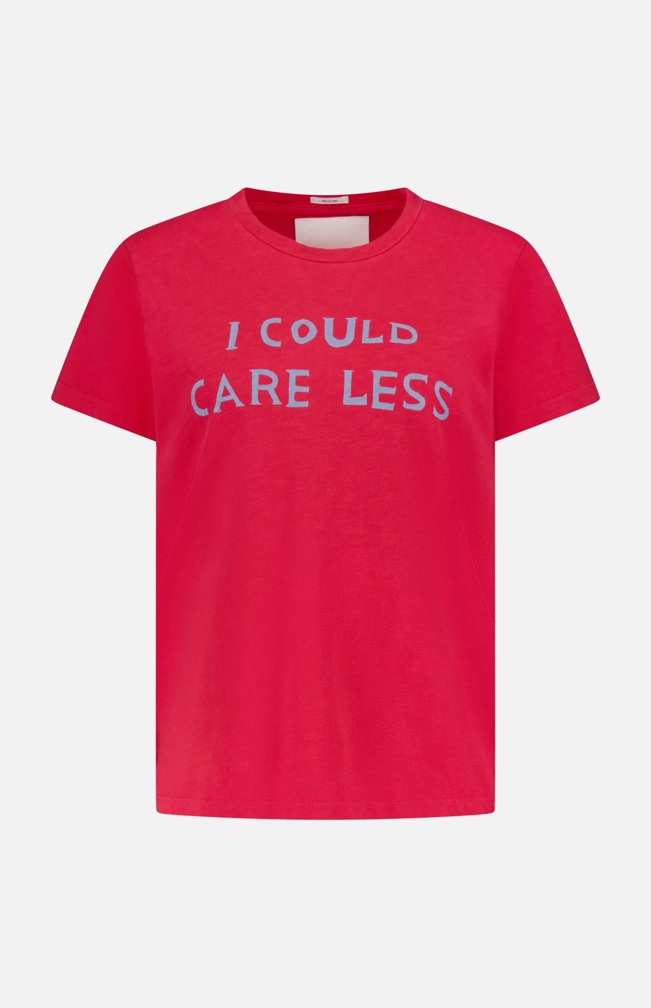 The Sinful Slim T-shirt by MOTHER is a bright pink vintage-style short-sleeve tee with "I COULD CARE LESS" in bold light blue letters on the chest, shown against a plain light gray background.