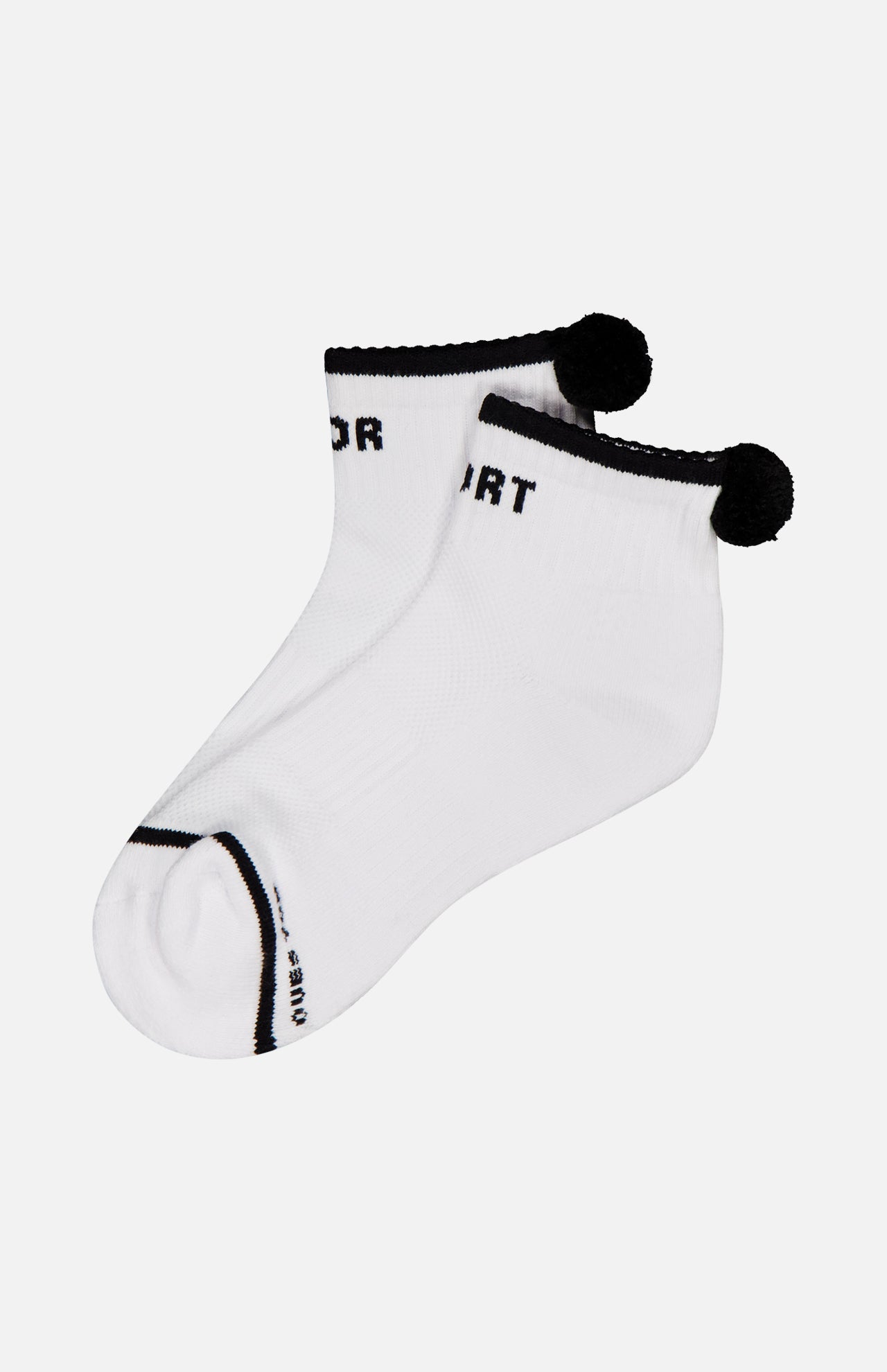 The MOTHER Baby Steps Ankle Socks are sporty white ankle socks with black trim, playful black pom-poms at the back, and black text accents near the top and toe for a fun, stylish look.