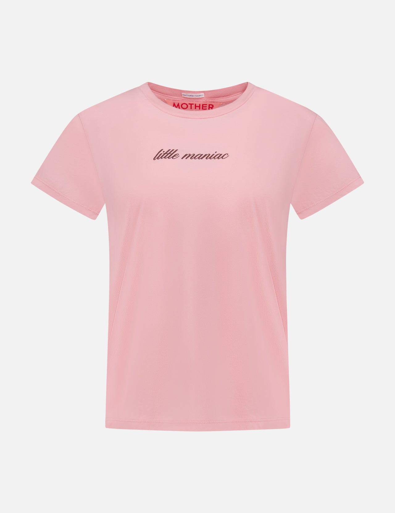 The Boxy Goodie Goodie T-shirt by MOTHER is a light pink slim fit shirt with "little maniac" embroidered in small black cursive across the chest and a red MOTHER label inside the collar, displayed on a white background.