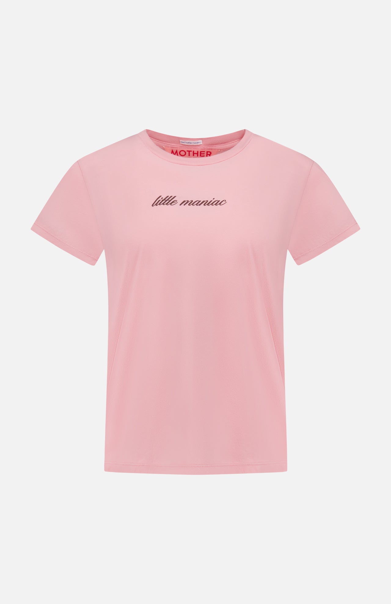 The Boxy Goodie Goodie T-shirt by MOTHER is a light pink slim fit shirt with "little maniac" embroidered in small black cursive across the chest and a red MOTHER label inside the collar, displayed on a white background.