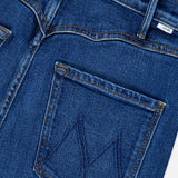 Close-up of the back of The Buckle Bunny Hustler Jean in Cosmic Cowgirl by MOTHER, featuring blue stretch denim with a stitched M design on the pocket, visible belt loops, and a small white label near the waistband.