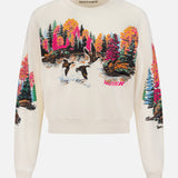 The Camper Lake Scene Sweatshirt by MOTHER is a cream cotton crew neck featuring a colorful lake scene with flying geese, autumn trees, a serene lake, and "MOTHER" on the chest.