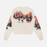 The Camper Lake Scene Sweatshirt by MOTHER is a cream cotton crewneck pullover with a vivid lake scene, flying geese, trees, and nature-themed art on the arms; features red Kith embroidery.