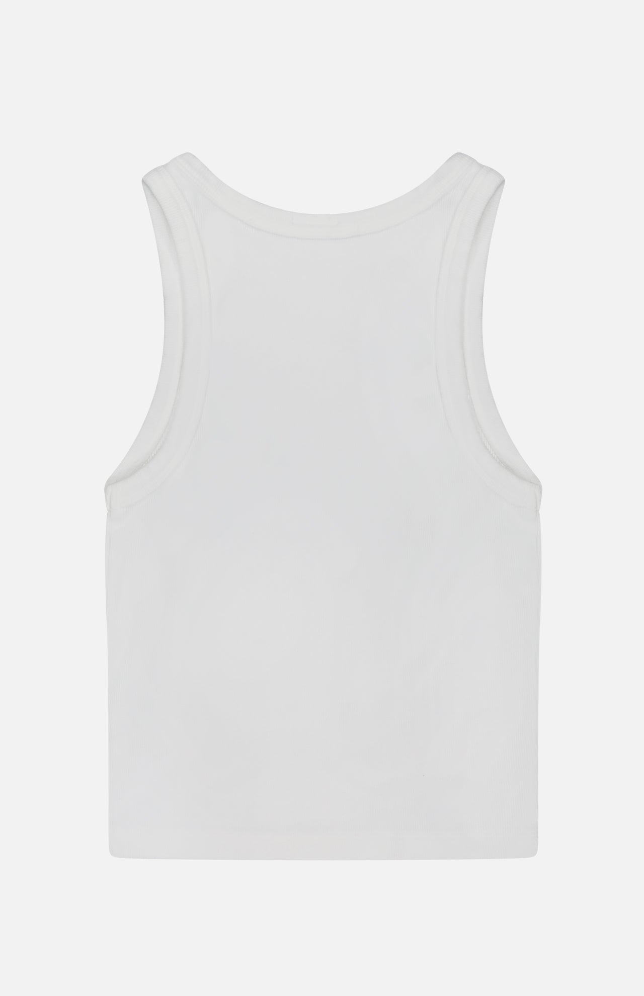 The Chin Ups Chop Tank Top by MOTHER is shown from the back against a light background. This smooth, plain white cropped tank offers a simple, versatile summer style with no visible logos or patterns.