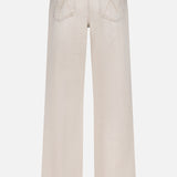 Back view of The Dodger Slouchy Fit Sneak Pants by MOTHER in light beige, featuring an oversized slouchy fit, two back pockets with stitched M detail, belt loops, and a straight hem.