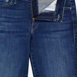 Dark blue stretch denim skinny jeans, the Mother The Down Low Looker Hover Jeans in Backstage, with a partially unzipped fly and a button closure at the waist.
