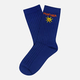 The Half Step Beaded Socks by MOTHER are blue, crew-length summer socks with ribbing and a yellow sun embroidered near the top—perfect statement socks for bright, sunny days.