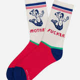 The Half-Calf Mermaid Socks by MOTHER feature red soles, blue toes and heels, white uppers with a topless mermaid graphic, bold "MOTHER FUCKER" text in red, and blue/red stripes—quirky multicolored tube socks with attitude.