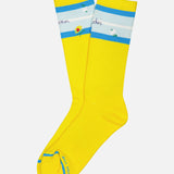 MOTHER’s The Half-Calf Socks are bright yellow crew socks in organic cotton, with white and blue top stripes, embroidered flowers and text, plus a contrasting green toe detail.