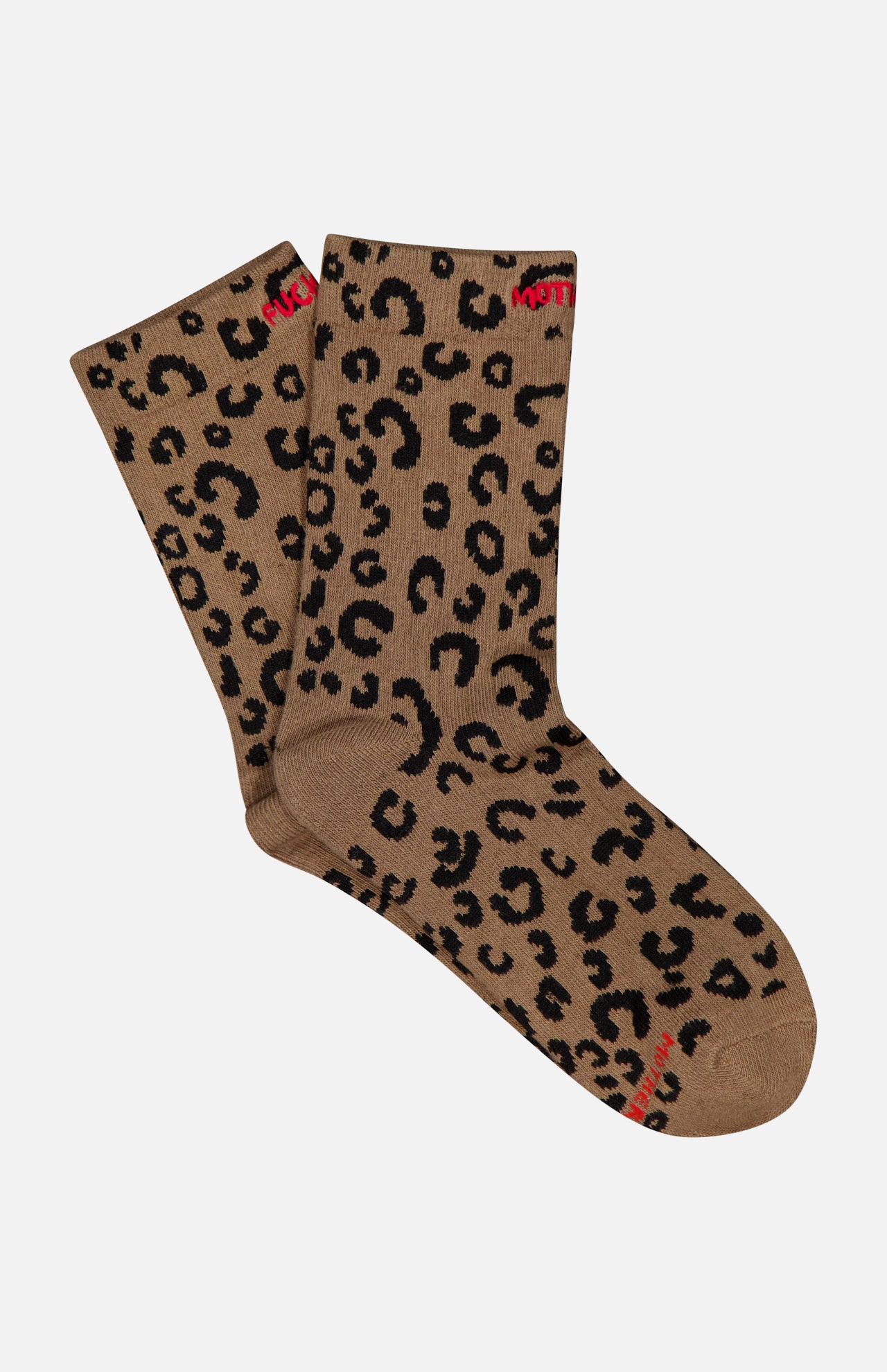 Introducing The Half-Step Cheetah Socks by MOTHER—a pair of brown crew socks featuring a striking black cheetah print and subtle red text accents near the top and toe. Displayed on a crisp white background, these statement socks are perfect for anyone looking to elevate their style.